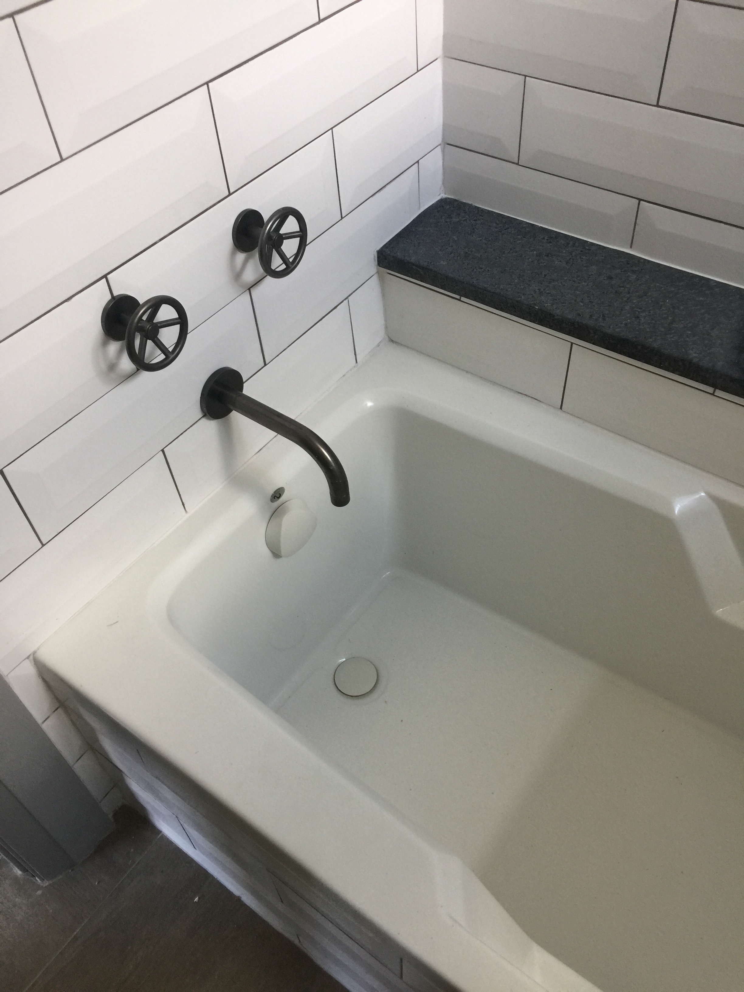 Cool faucet handles in the boy's bathroom tub - Shundra Harris Designer