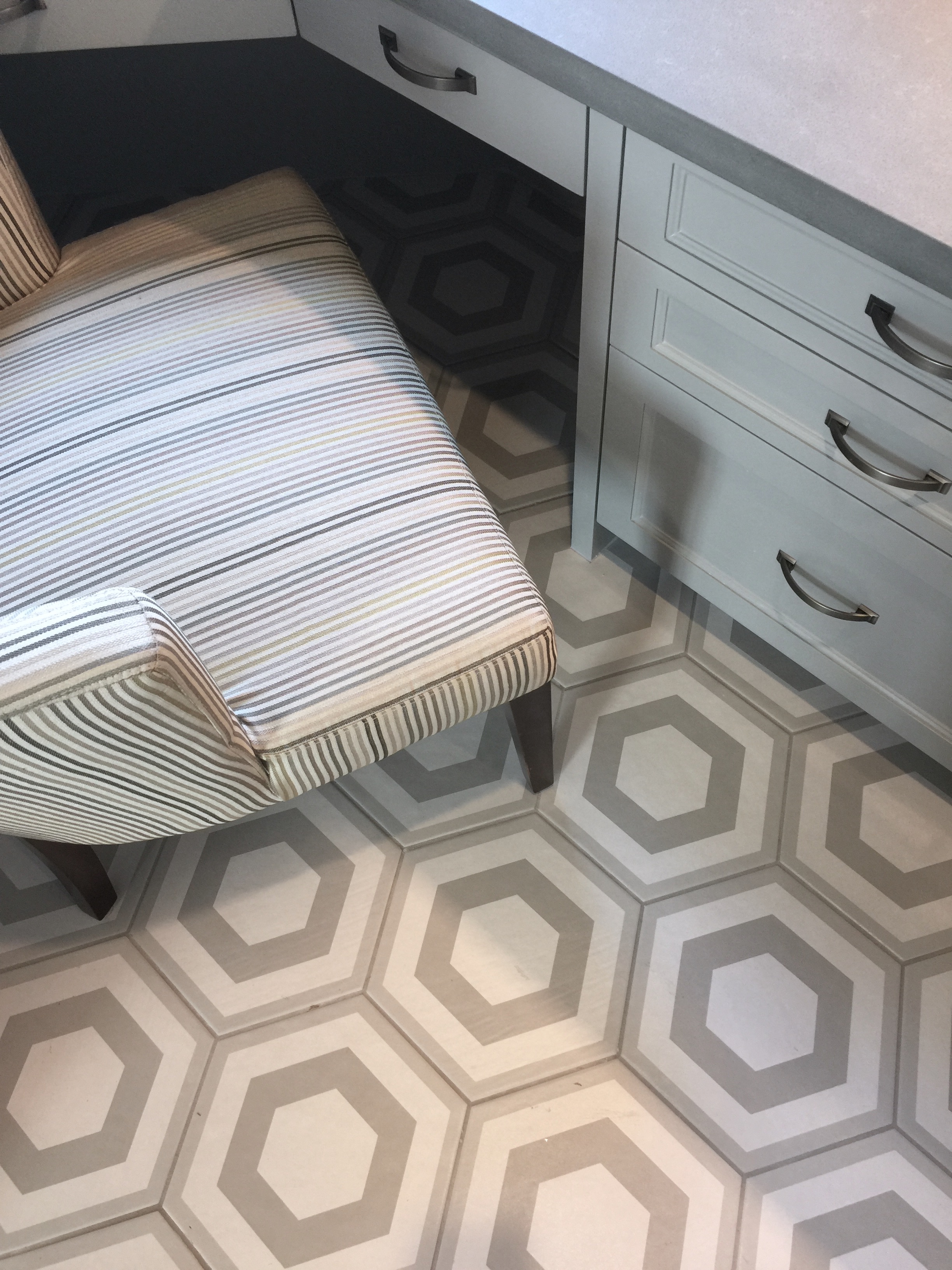 Fab hex tile flooring in the mud room - Peterson Homebuilders