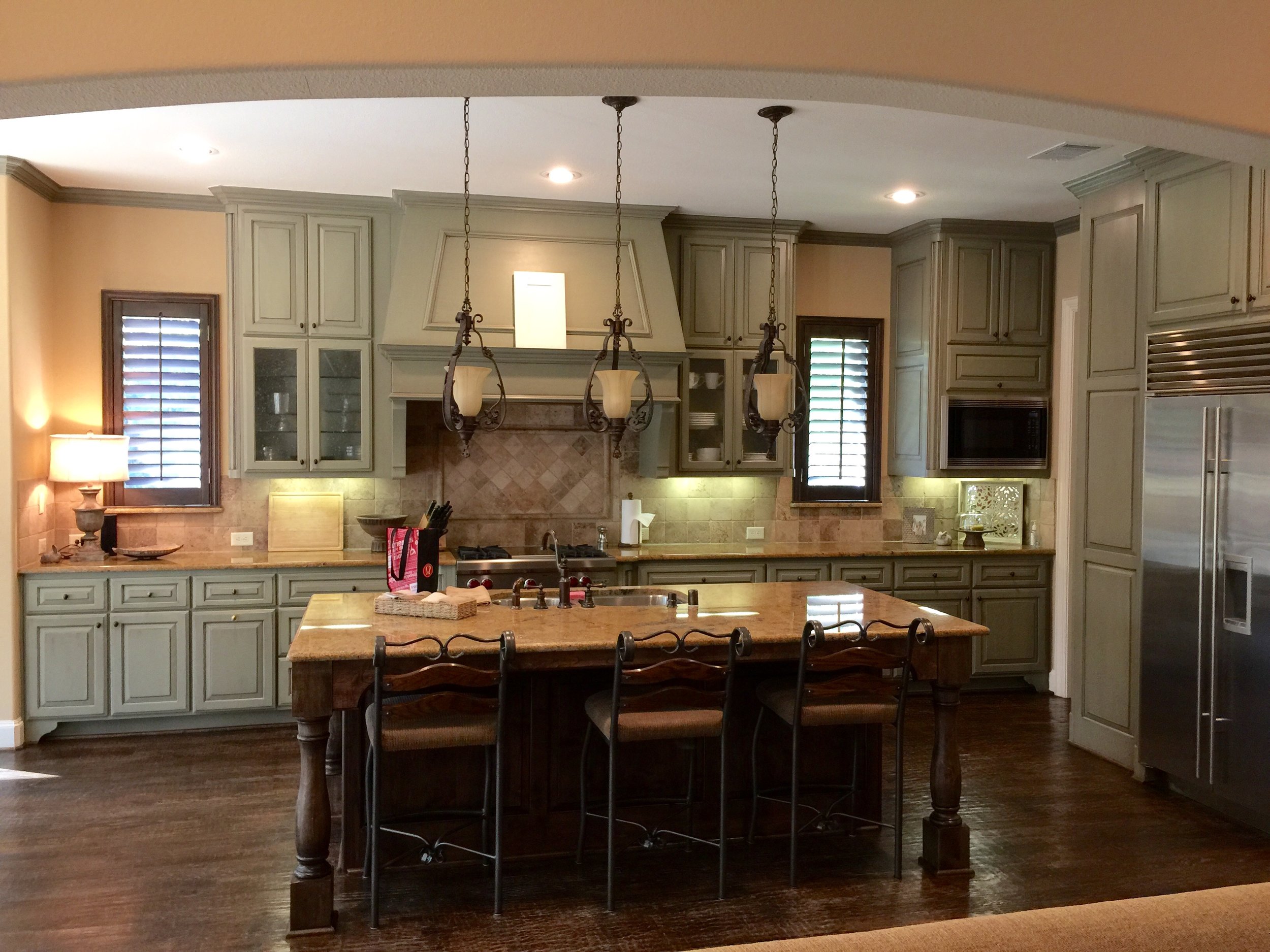 Before kitchen remodel - wall mount microwave on right to be moved below counter