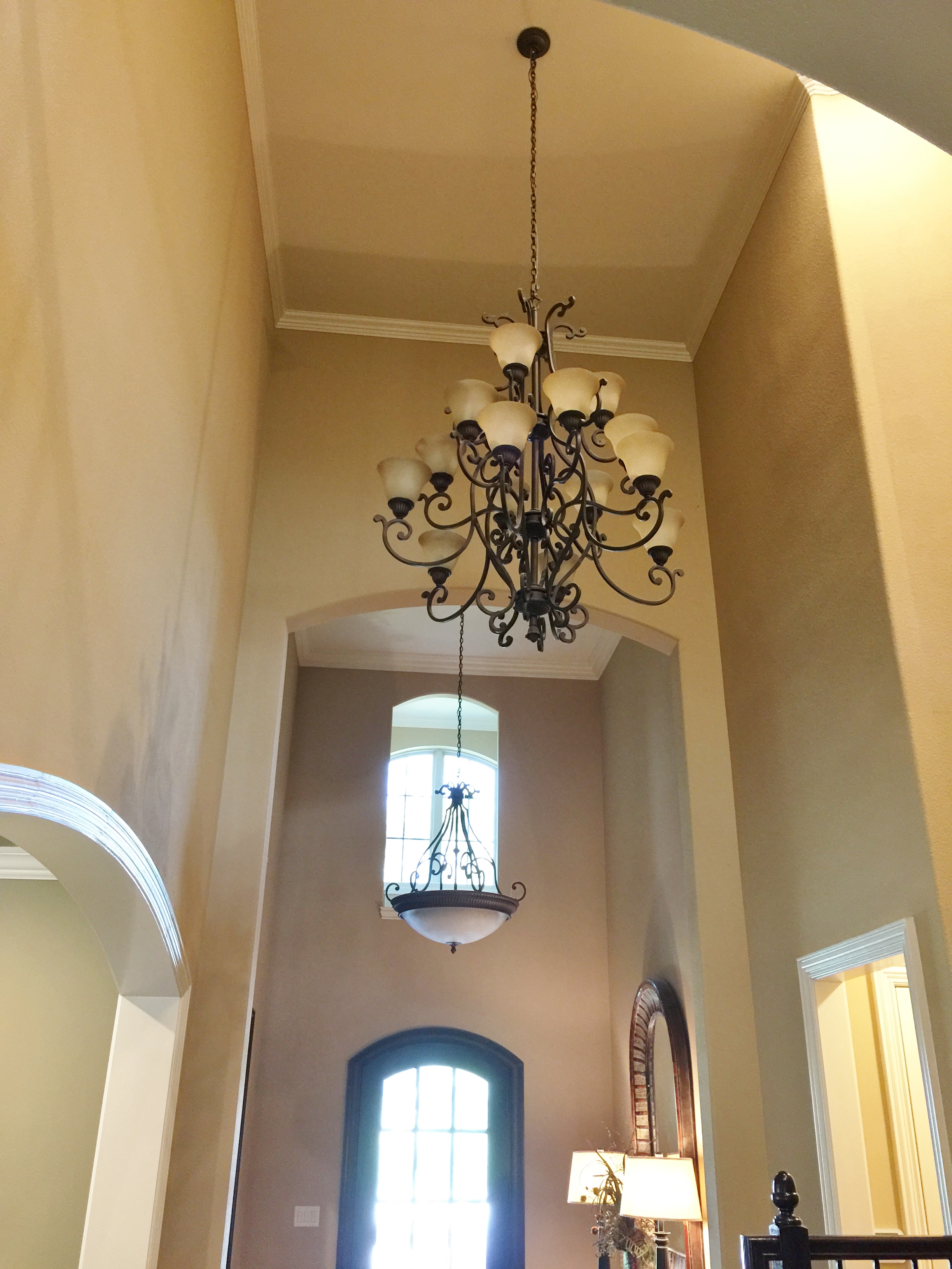 Before - Gold beige walls throughout with creamy yellow white trim color