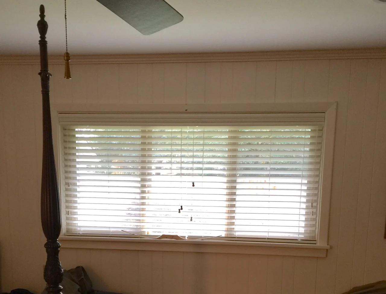 Before remodel with high long window facing back yard - to be replaced with French door slider
