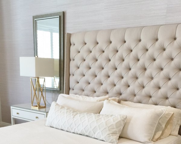 How tall should your nightstand be? Master bedroom designed by Carla Aston.