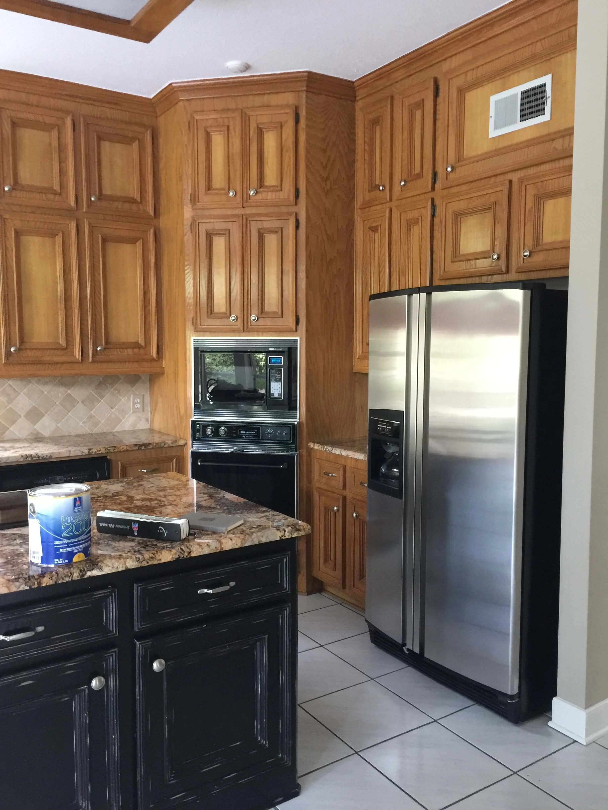 BEFORE AND AFTER A Dated Wood Kitchen Goes All White And Bright