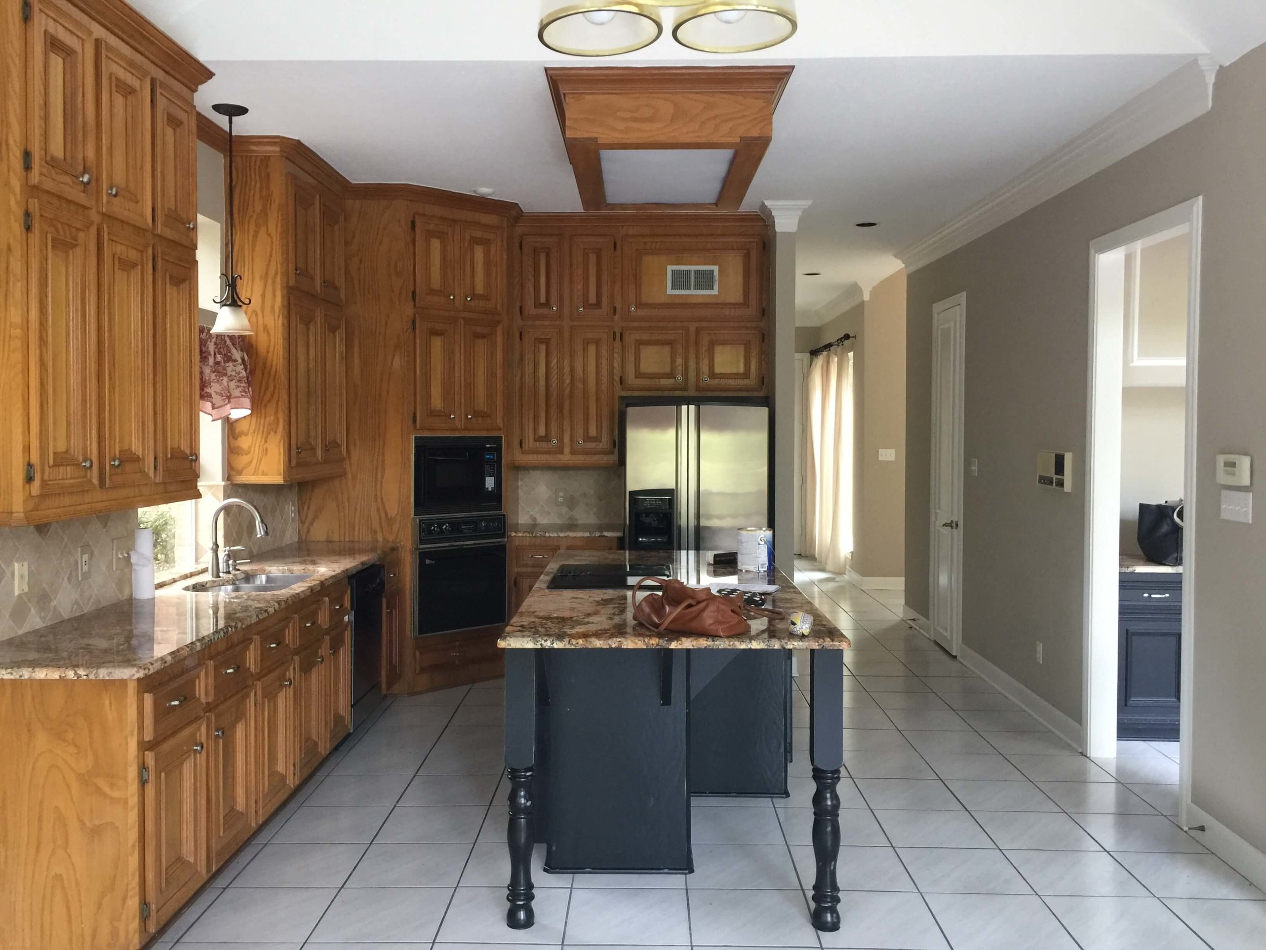 Before And After A Dated Wood Kitchen Goes All White And Bright