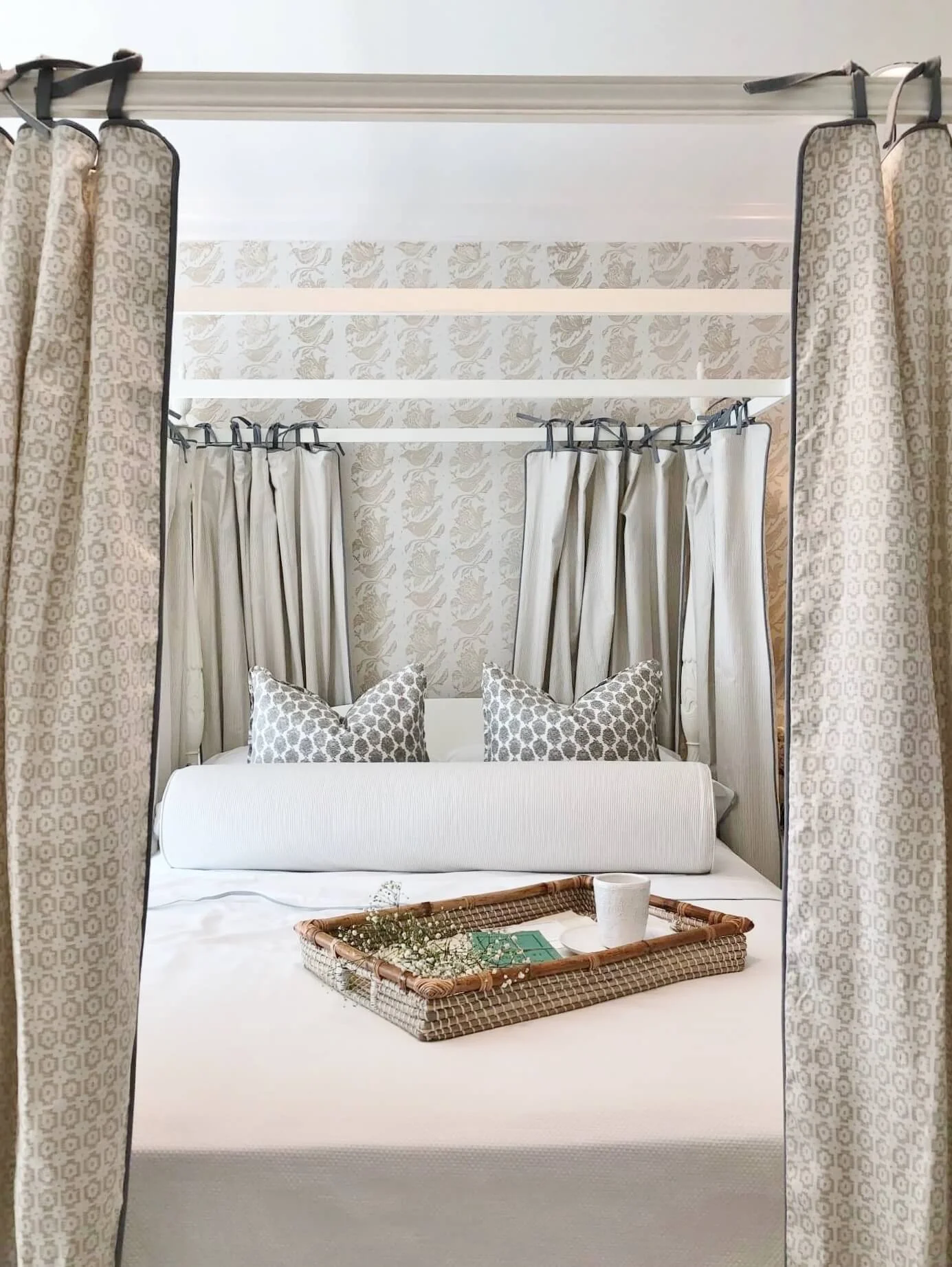 This bedroom was a vision of neutral, tone on tone pattern creating a private space with a lovely canopy bed. Designer, Sherrell Neal, Sherrell Design Studio | ASID River Oaks Showhouse #canopybed #neutralbedroom #whitebedding