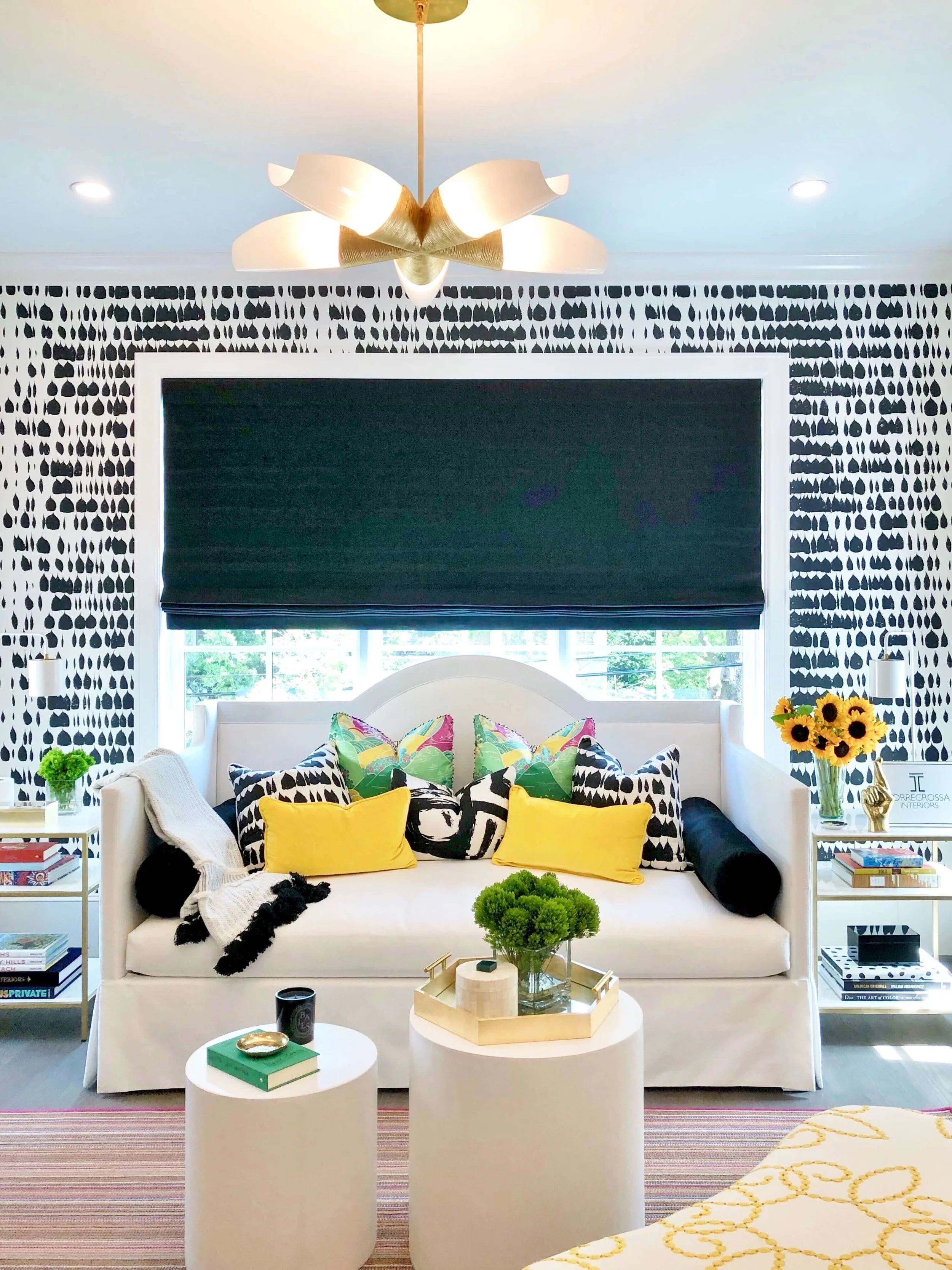 This fun, black and white bedroom, designed by Tiffany Montgomery of Torregrossa Interiors, is made colorful with bright yellow and green accents for a youthful, bold space. ASID River Oaks Showhouse #bedroomdesign #daybed #blackandwhite #bedroomdecor #girlbedroom