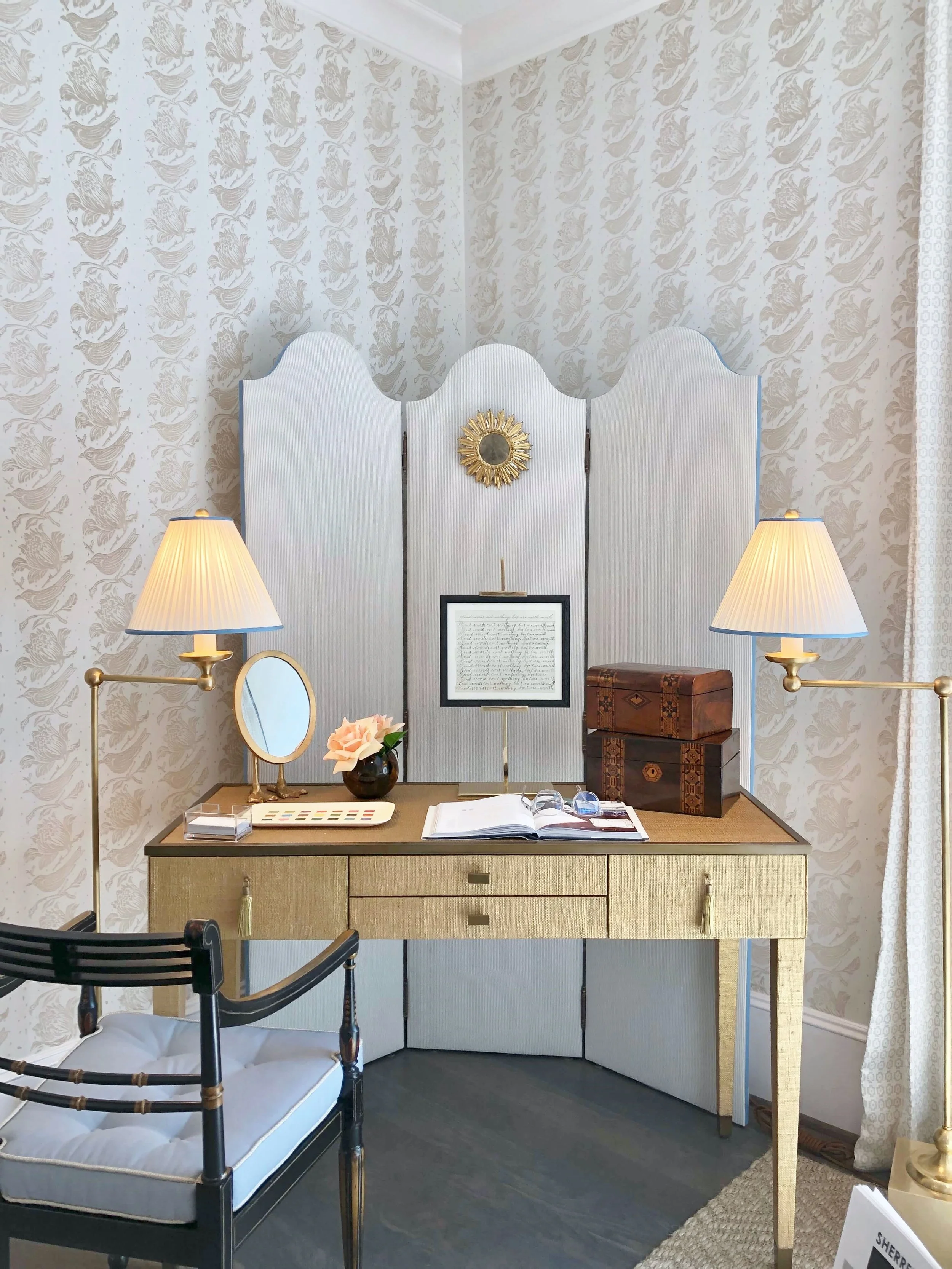 Small desk on an angle in the neutral bedroom with an upholstered screen and pretty wall pattern. Designer, Sherrell Neal, Sherrell Design Studio | ASID River Oaks Showhouse #neutraldecor #desk #bedroom