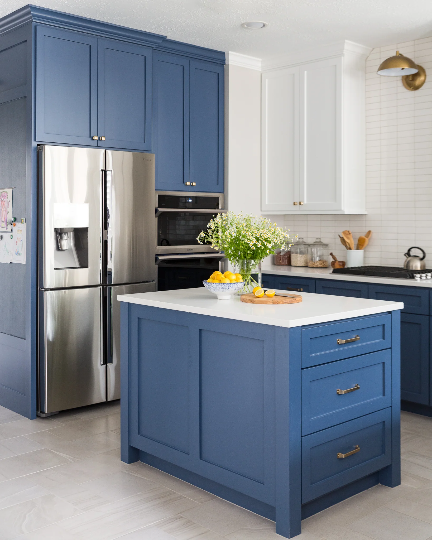 Kitchen remodel - new island with navy cabinets and white quartz countertop in rectangular shape | Carla Aston, Designer #kitchenisland #navycabinets #kitchenremodelingideas