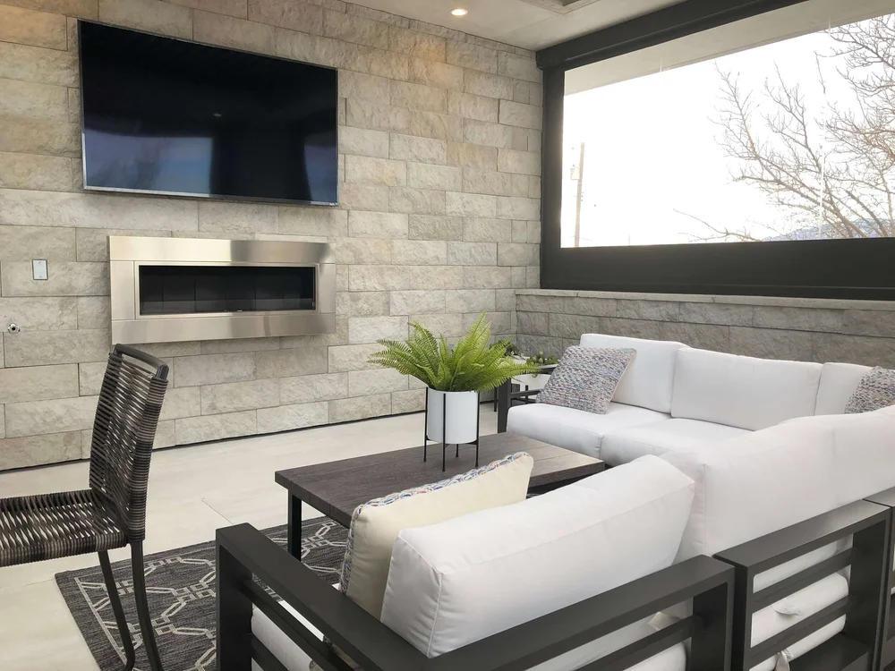 Phantom screens covered the open areas, to make this space usable any time of year. The New American Remodel TNAR | #remodeling #remodel #balcony