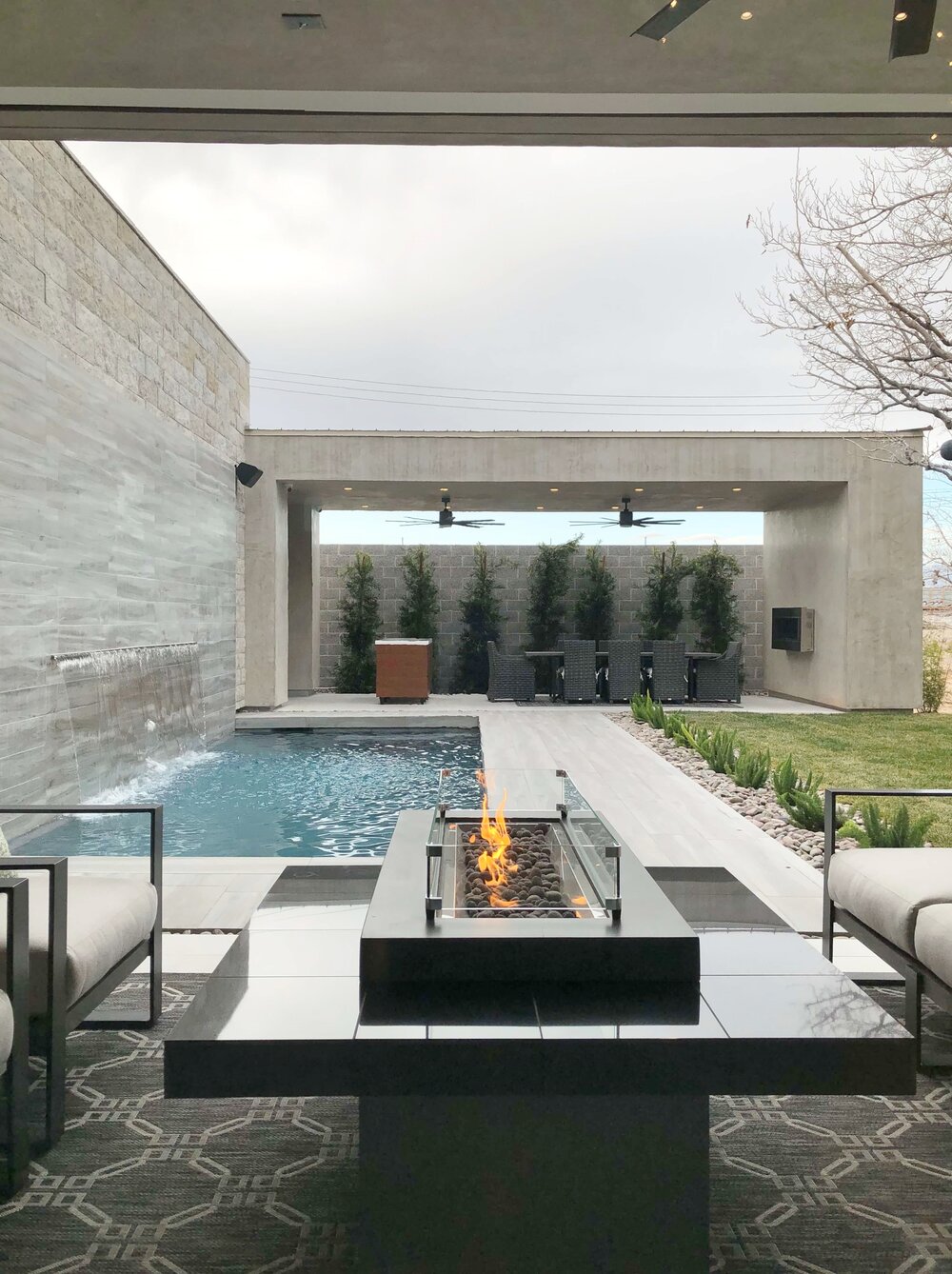 Contemporary outdoor living oasis at The New American Remodel TNAR | #remodeling #remodel #outdoorliving #patio #pool #outdoorfirepit