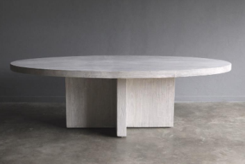Elliptical Oval Table from Clubcu in reclaimed elm makes a strong statement in any dining space.