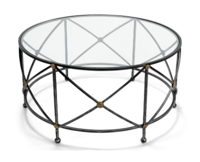 The Fife and Drum round glass top table from Sarreid, Ltd., uses the popular “X” design to add interest and detail.