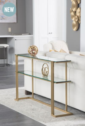 This new metal and glass console from  Charleston Forge  is just the perfect size and visual weight to slip into a crowded room when you need something interesting behind a sofa.