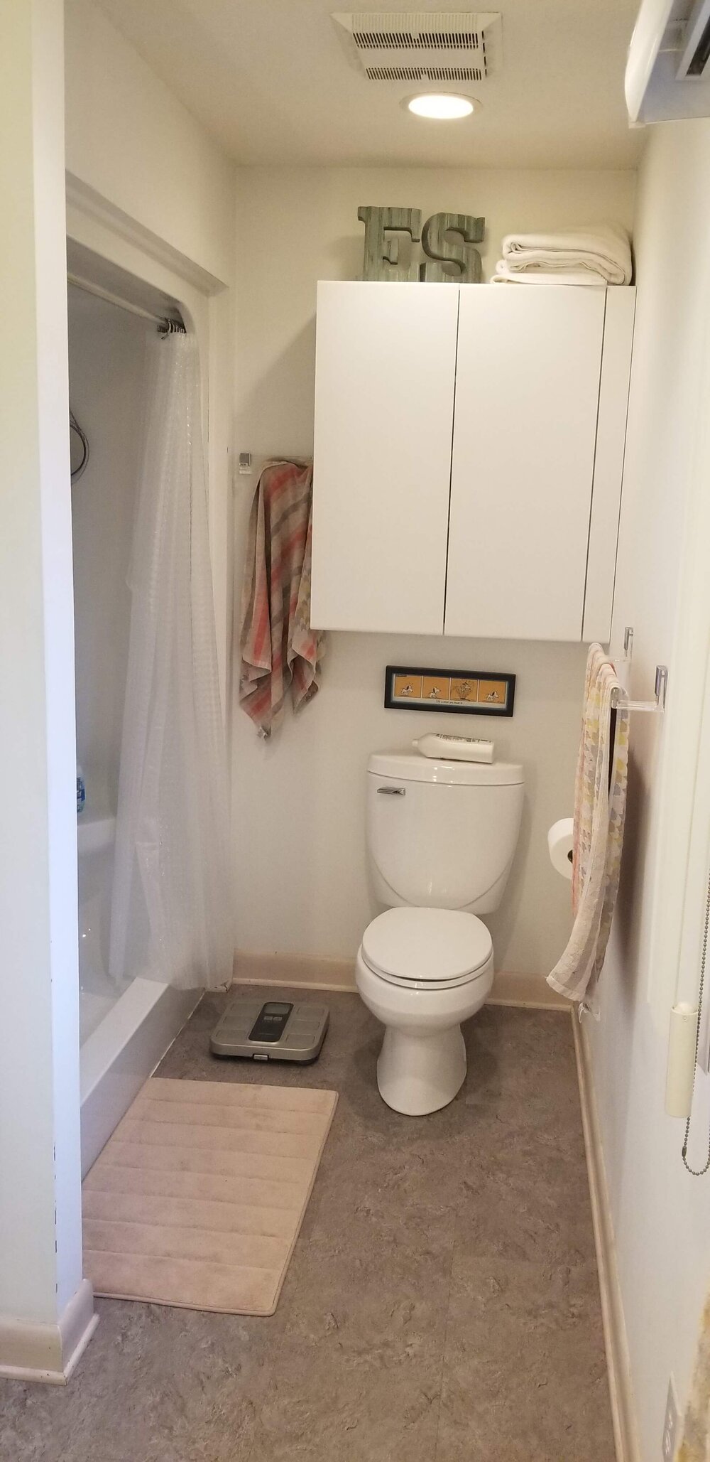 BEFORE - Bathroom to be remodeled with new shower area.