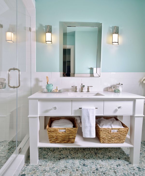 Feminine bathroom in Tiffany blue with pebble tile floor and custom vanity for a girl’s bathroom. Carla Aston, Designer | Miro Dvorscak, Photographer