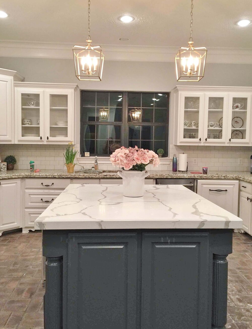 The new kitchen island countertop and new backsplash made a big difference in this kitchen’s updated look.