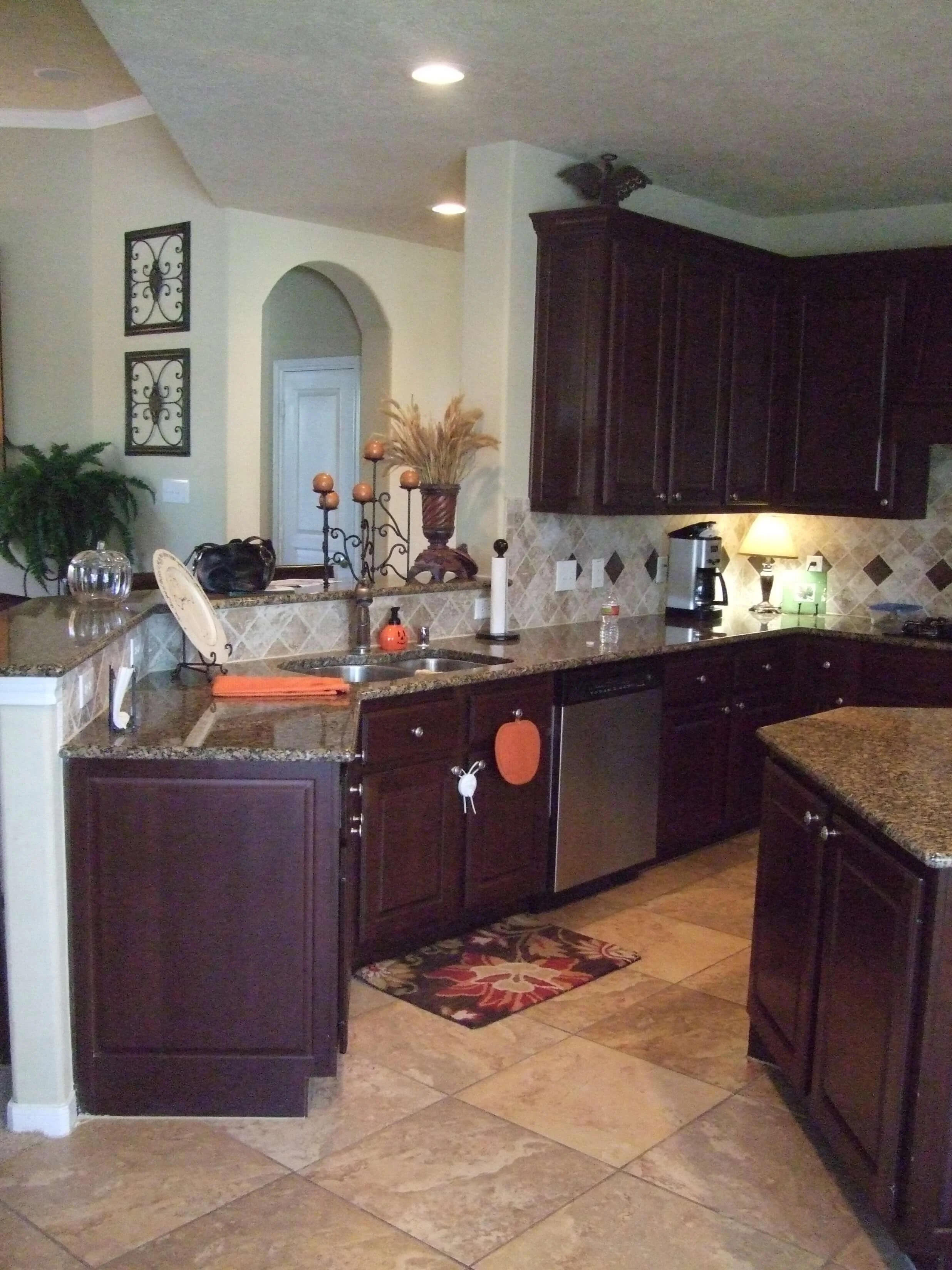 Tired Of Your Kitchen's Stale Espresso-Colored Cabinets? Do This