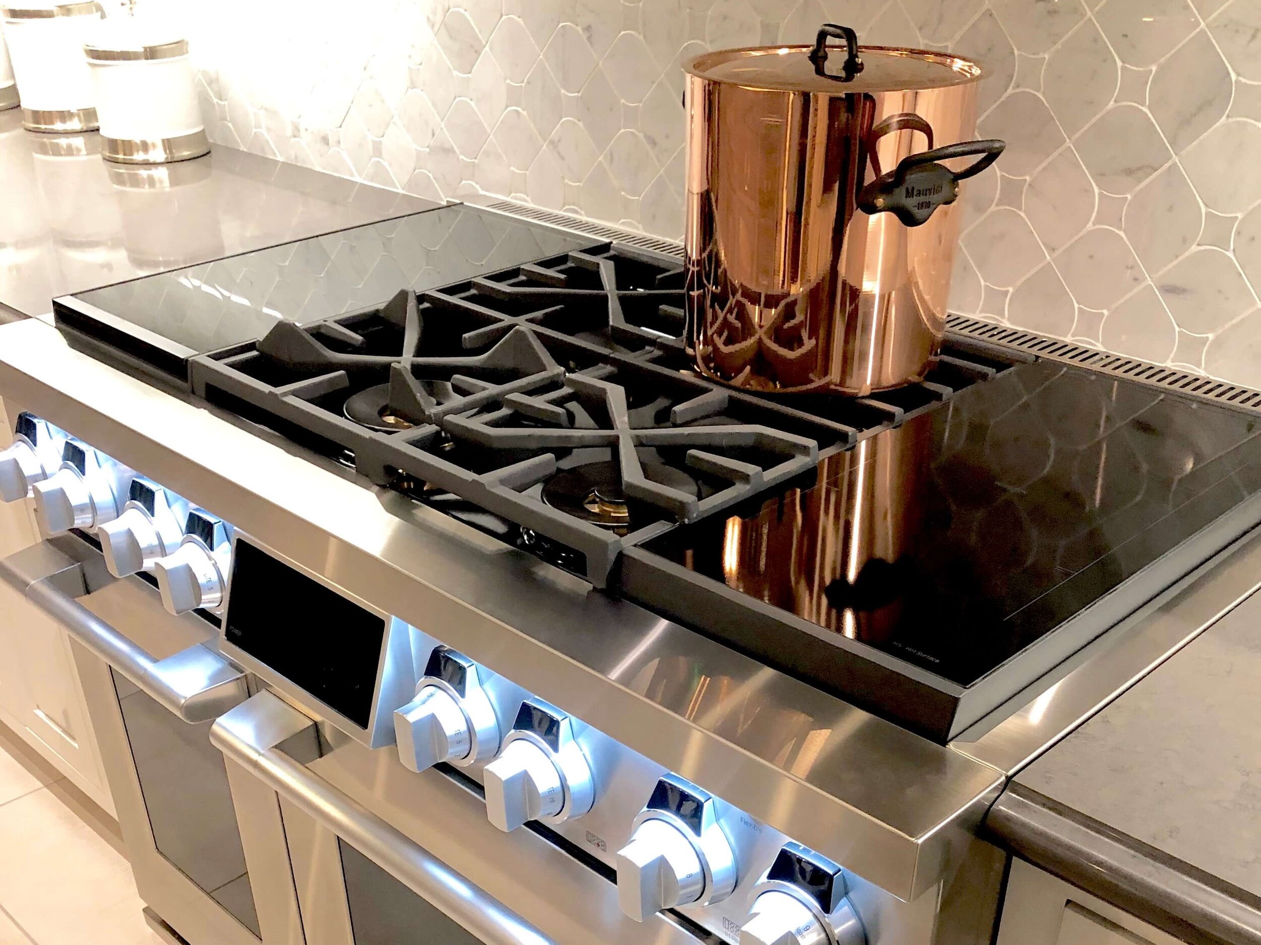 Cooking on a modern design gas stove burner - kitchen tools