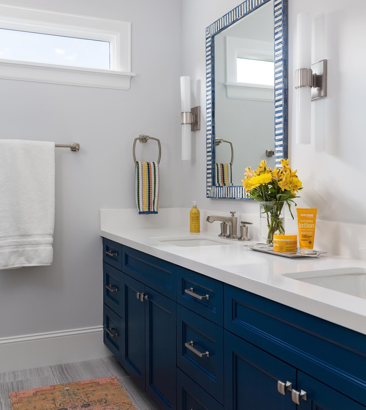 This upstairs bath got a lift with a complete remodel. Some fun tile and mirrors gave it a fresh appeal for the young ones of the family. Swipe to see more pics! #designedcarlaaston Photo by @collscottphoto #designhouston #thewoodlandstexas #bathroom