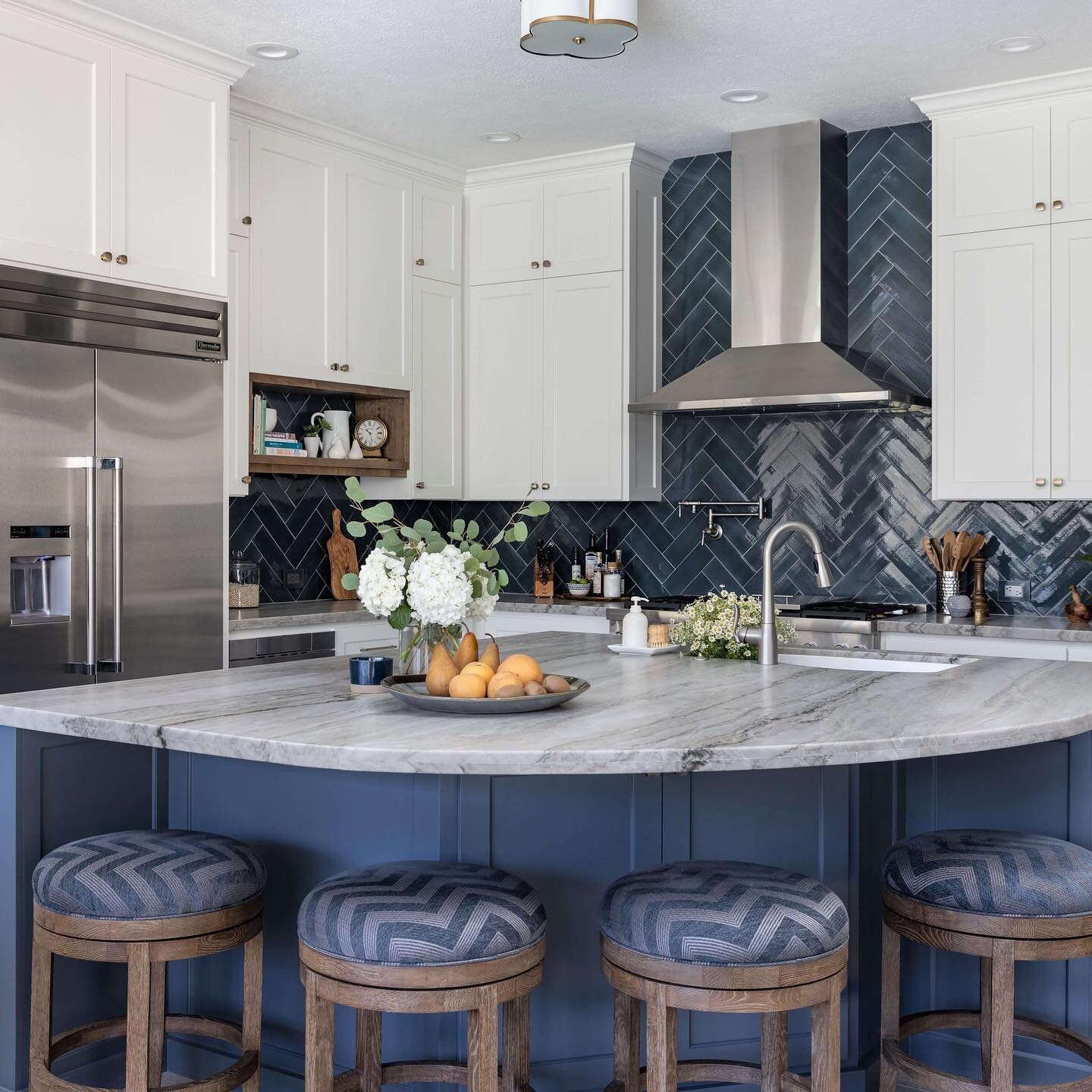 I&rsquo;m sharing a new kitchen remodel project on my blog today with some great before and afters! This redo greatly enhanced the function of this kitchen. That bold blue backsplash is really the star! See all the pics at the link in profile. #desig