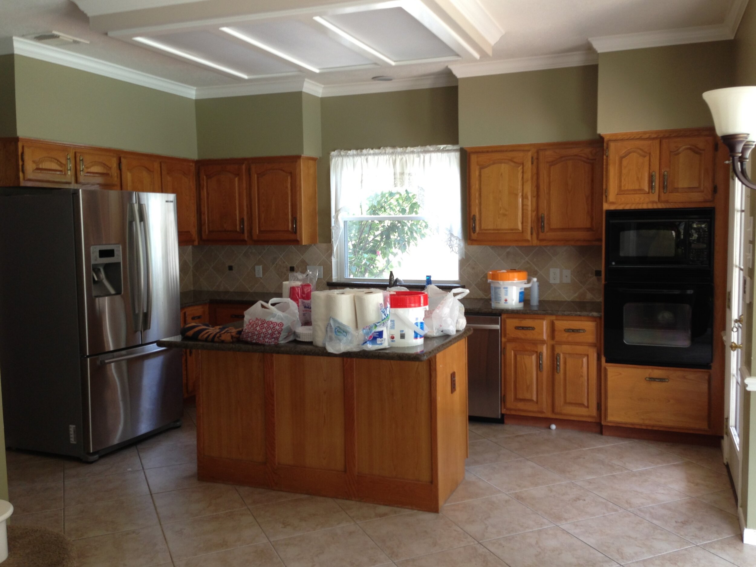 Are Upper Kitchen Cabinets Of Varying Heights In Style Designed