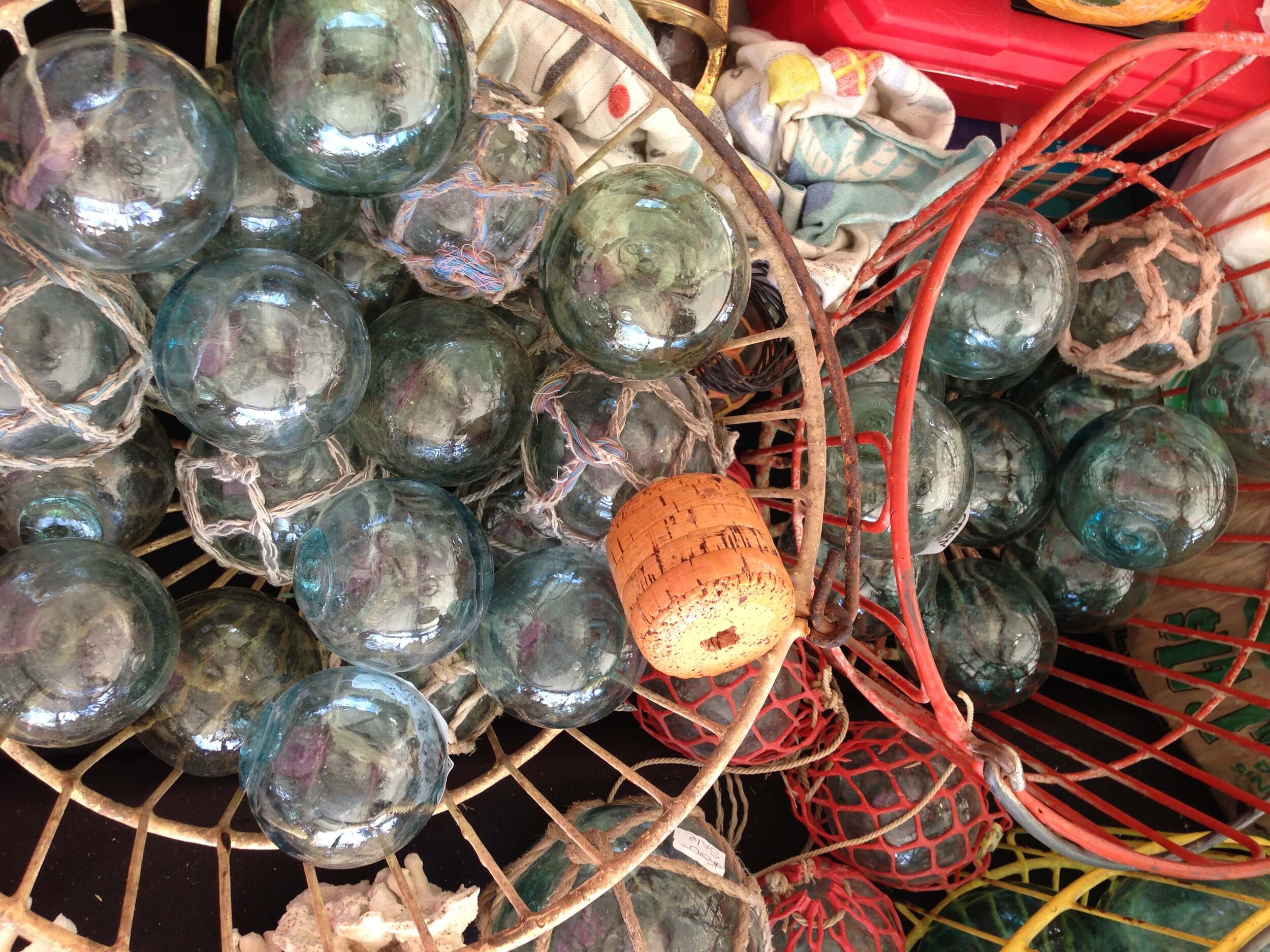 https://images.squarespace-cdn.com/content/v1/4fcf5c8684aef9ce6e0a44b0/1621115559445-4KVM2F3IP51O026I0B6U/vintage+glass+fishing+buoys