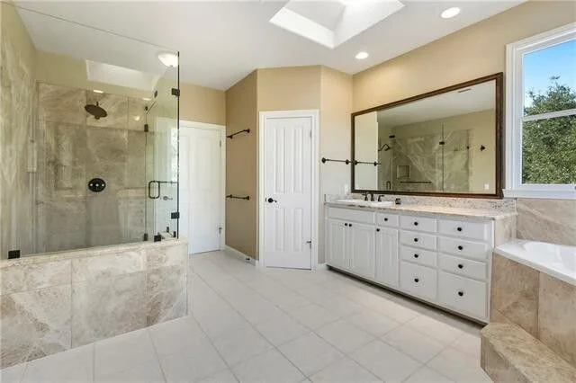 BEFORE  - A large but plain primary bathroom to get a design update with a remodel.  carlaaston.com