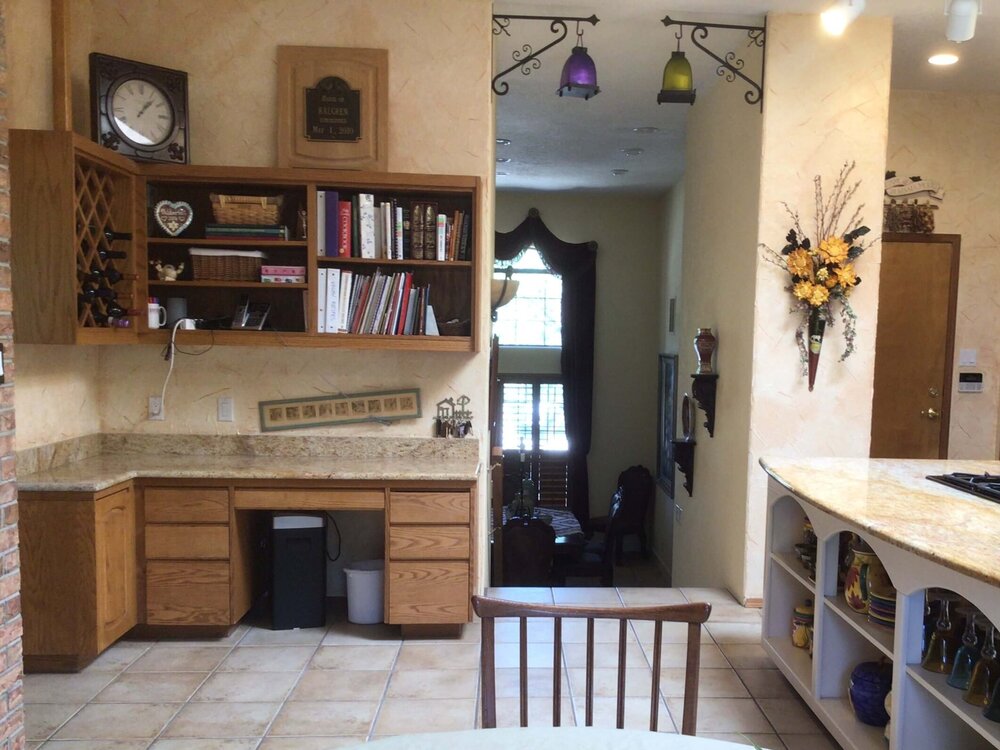 Existing desk area in the kitchen which doesn’t appear to be used much. carlaaston.com