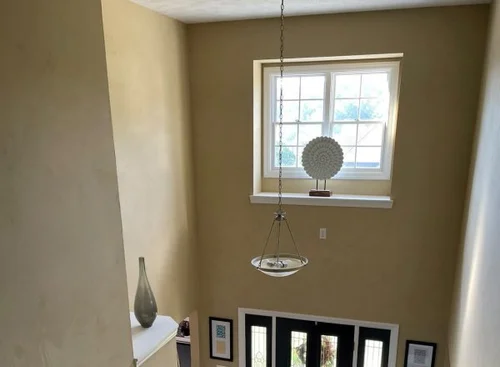 How to Decorate a 2 Story Wall: Stunning Ideas for Impact