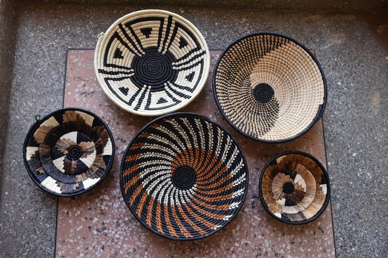 African black and neutral round baskets