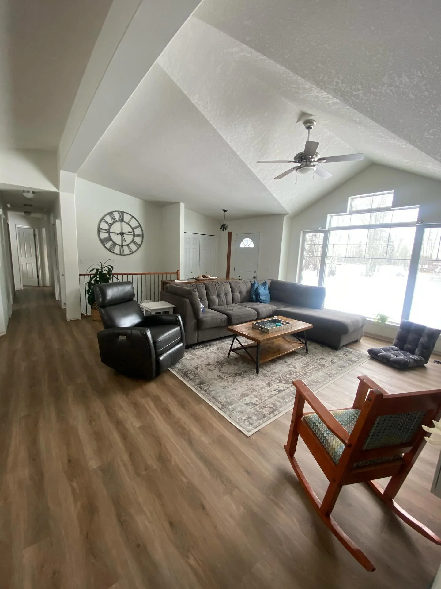 Living Room with Angled Ceilings Presents a Challenging TV Wall — DESIGNED