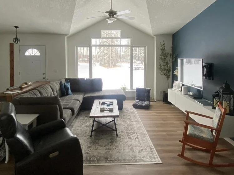 Living Room with Angled Ceilings Presents a Challenging TV Wall — DESIGNED