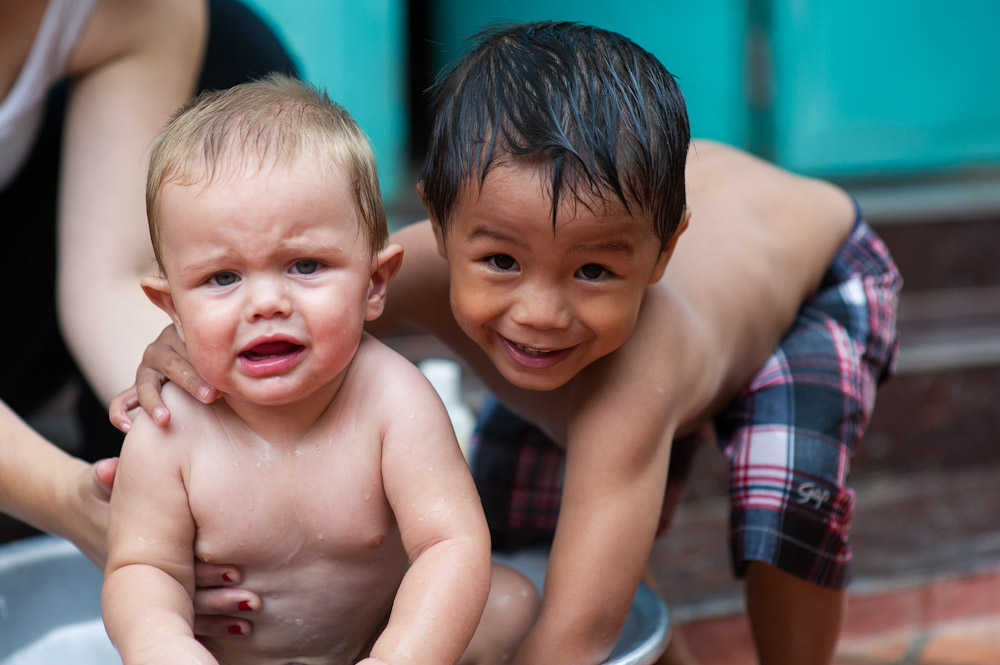 So caleb got crabby when we decided to give him a bath outside. Clearly, Aaron is trying to encourage him :)