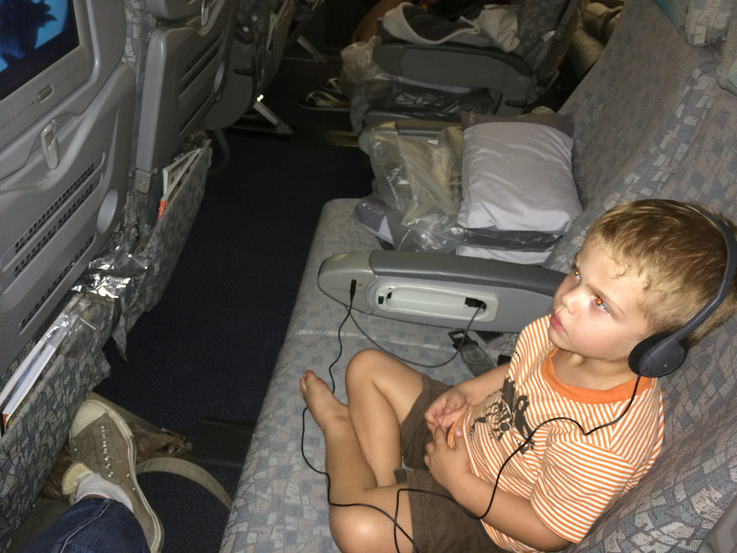 Caleb was pretty excited to watch Frozen on the plane. We were so fortunate to have a whole row to ourselves too!