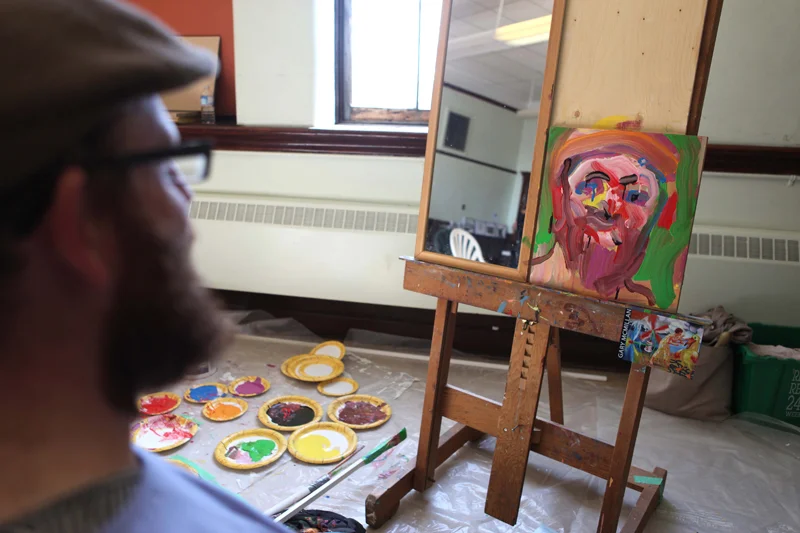 The resulting painting had a likeness of Glen, except for the angry eyebrows.
