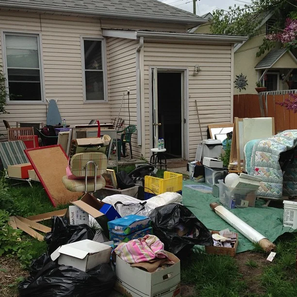 The back end of our house has always been ugly. The flood is more incentive to do something about it.