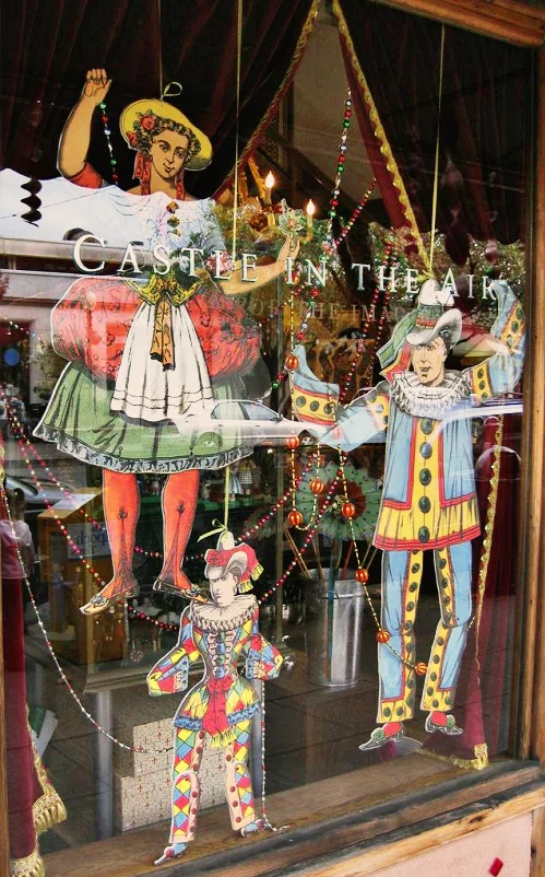 Castle in the Air window display using enlarged Victorian paper cutouts. 