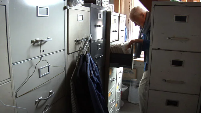 For most of his career, Bill lived a monk-like existance in an artist studio above Carnegie Hall. Surrounded by filing cabinets and stacks of books and magazines, he slept on a simple cot and didn't have a kitchen. During the filming of the movie (released 2011), Bill and the other residence were faced with finding new accommodations. There is another documentary dedicated to these artists and their stories: Lost Bohemia .