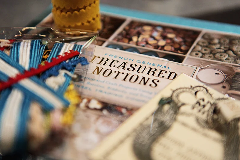 My purchases: a spool of yellow trim, a package of assorted vintage trim from the Tinsel Trading archives, some vintage thread and French General's book Treasured Notions featuring supplies from Tinsel Trading Company. (Published by Chronicle Books.)