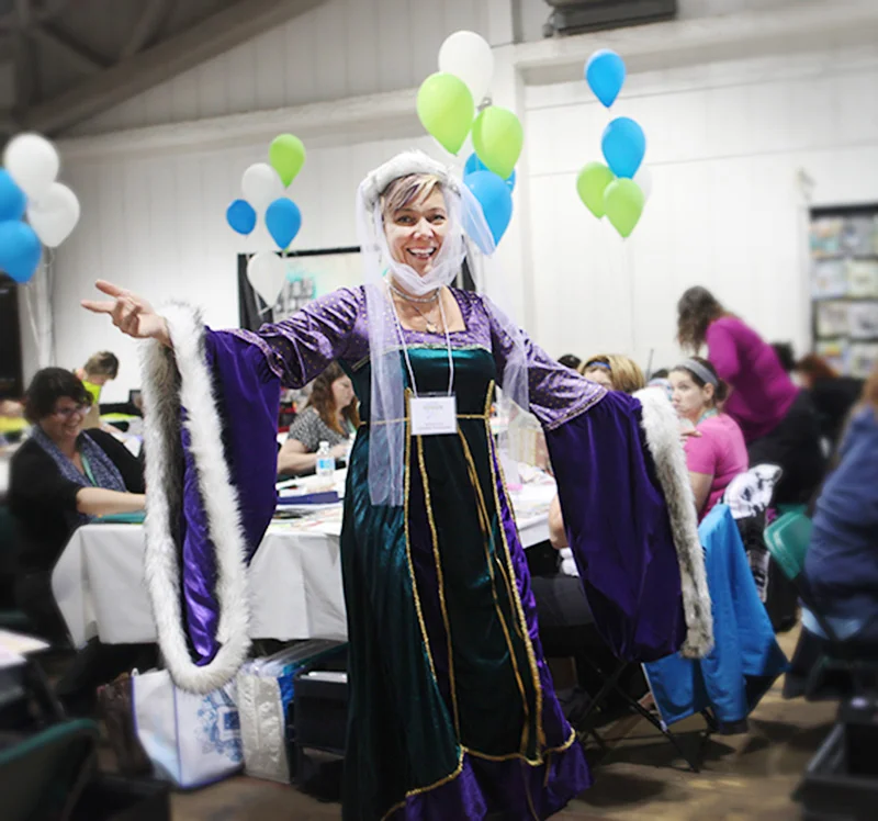 Katharina Doyle , co-founder and publisher of Canadian Scrapbooker is dressed to preside over the Carnival!