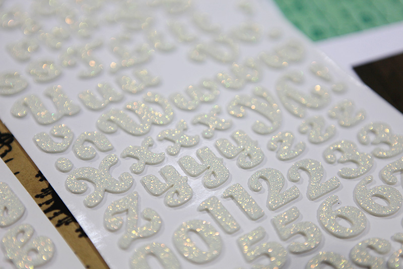 Letters always catch my eye... particularly here when they're glittered stickers.