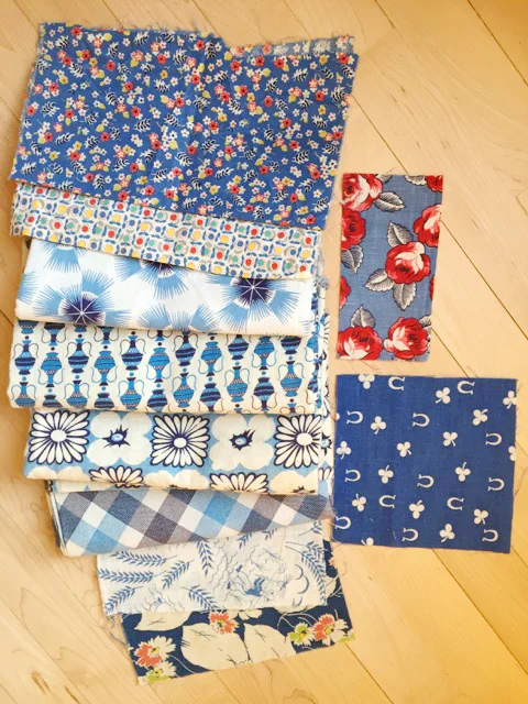 This photo shows the original feed sack swatches (two of which didn't make it into the final line). It gives you an idea of how close the Moda fabrics come to the originals.