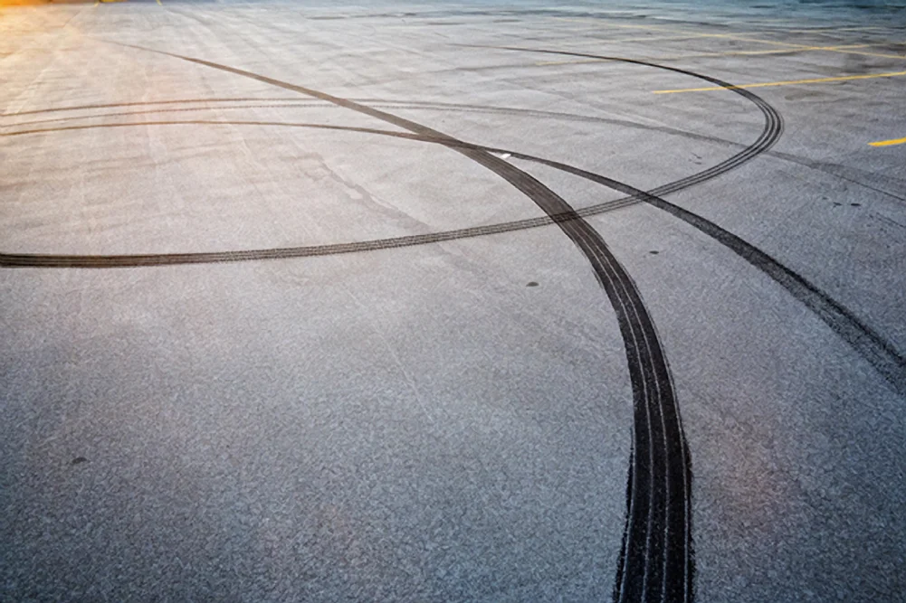 Another image from the Parking Structure study. Lately, I've really been fascinated by the tire marks here. There's a beauty to them. An emptiness, too. And, they are in the spirit of my of my images that are without people, but show clear evidence that someone was once here - the story is for the viewer. (See just below for perhaps my favorite of the tire mark shots...so far). 18mm, f/5.6, 1/125. Manual mode.