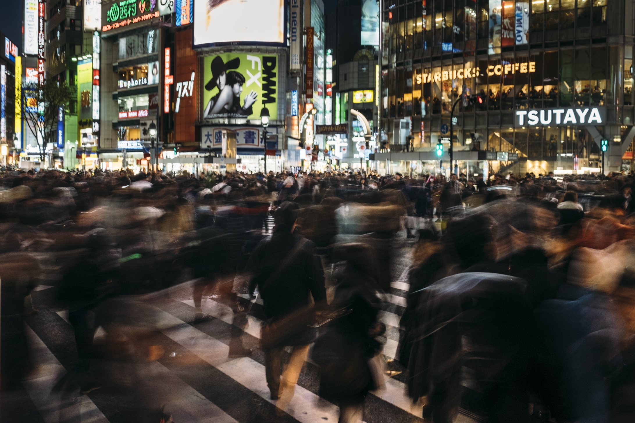 Shibuya Crossing, Tokyo. F/9, 1/2 second, ISO 200, 23mm. (No room for tripod, even if I did bring one! Did the best I could.)