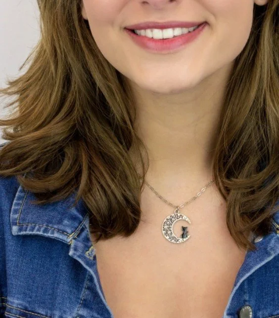 moon cat necklace on model.jpg