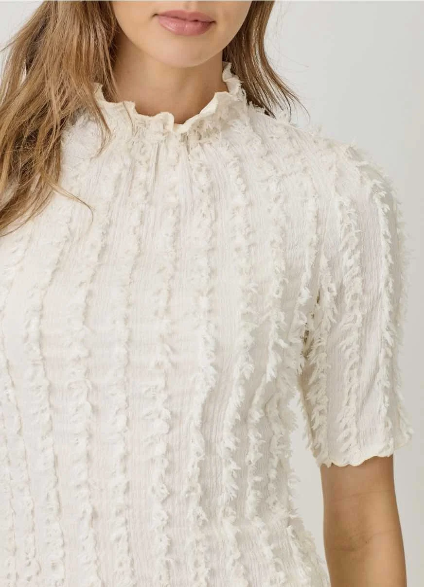 ivory fringe top closeup.jpg