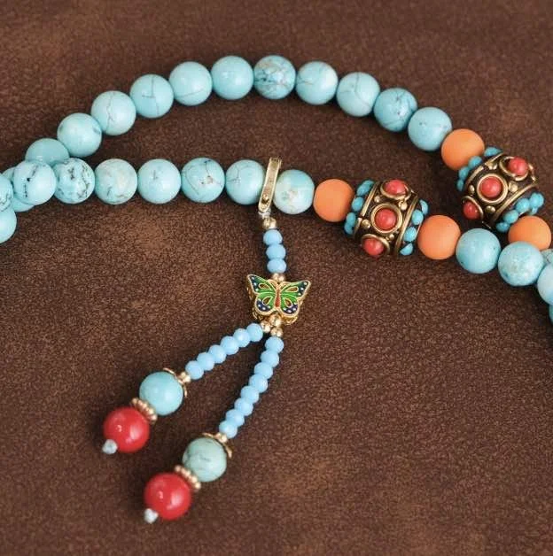 necklace detail butterfly tassel.jpg