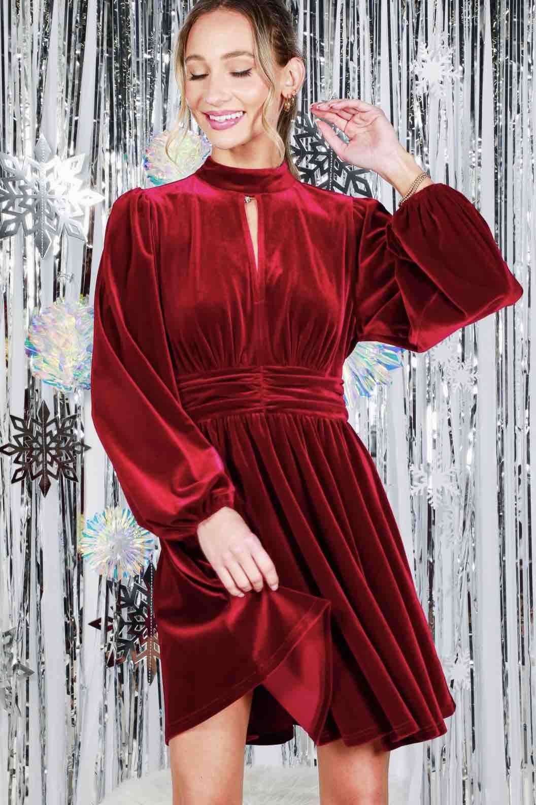 red vekvet dress standing.jpg