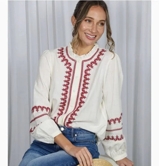 emb red top sit.jpg