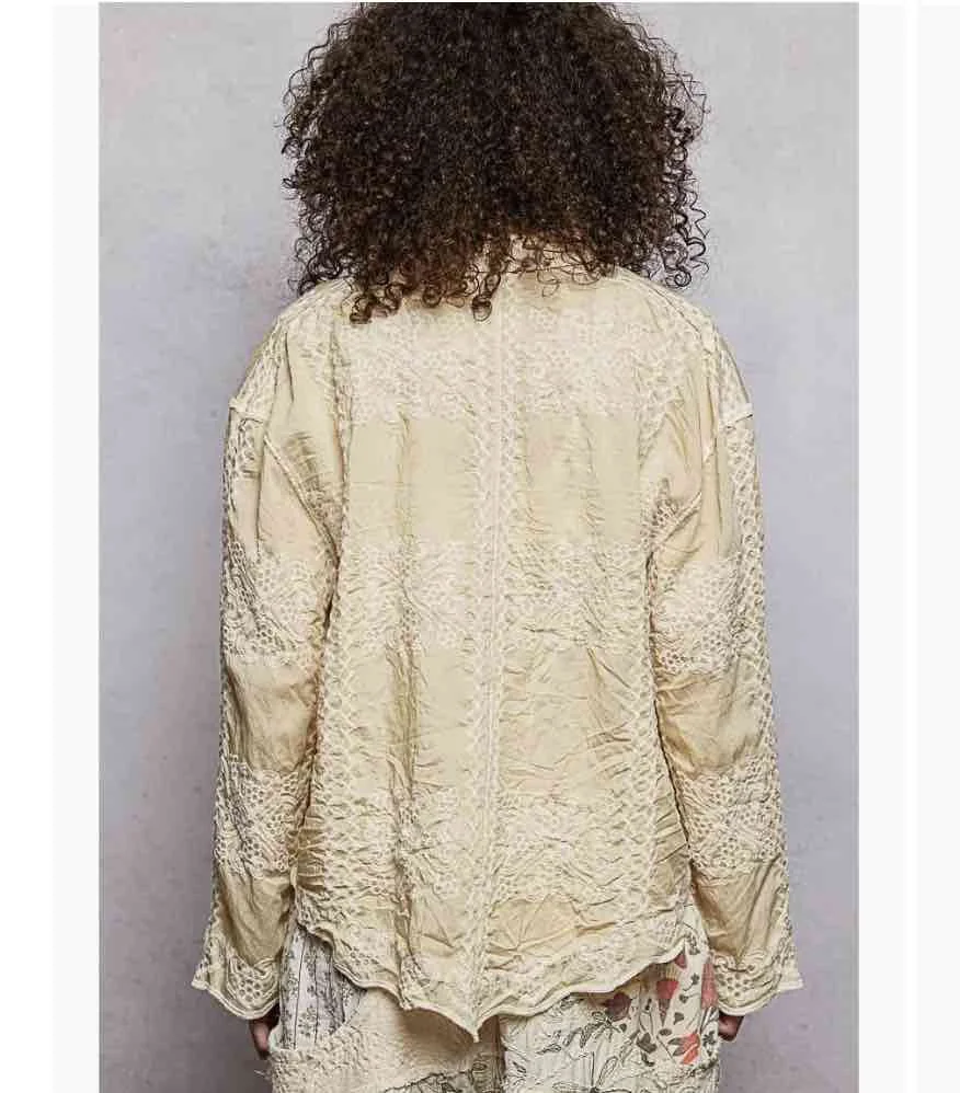 embroidered golden shirt back pol.jpg